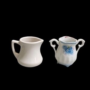 Cream and Floral Ceramic Pitchers